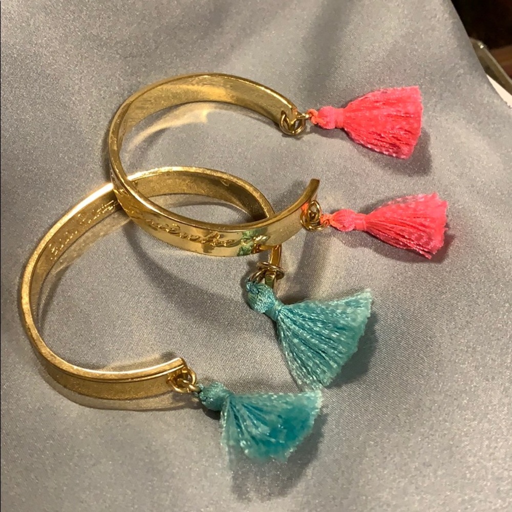 Set of 2 gold Lilly cuffs with tassels and sayings